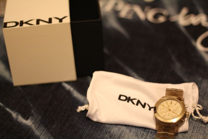 see through golden DKNY watch